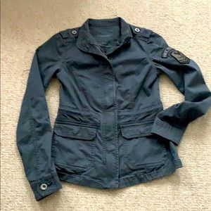 Grey military jacket with patches